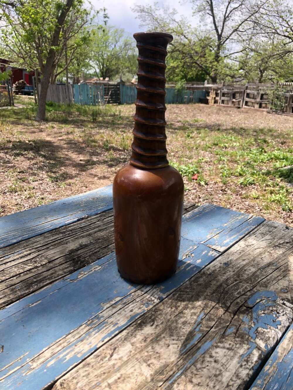 Brown Ceramic Decorative Bottle.